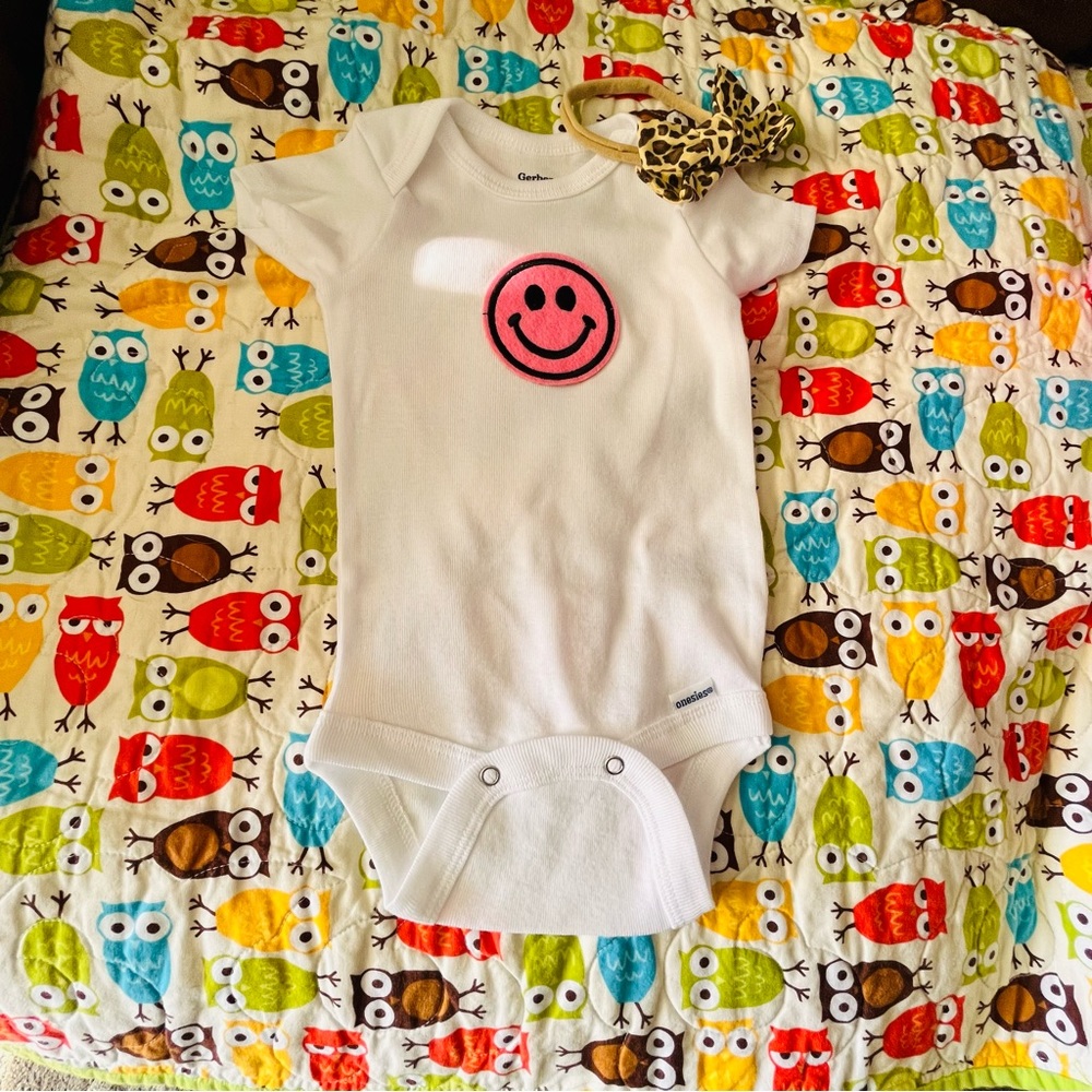 “Pink Smiley” onsie